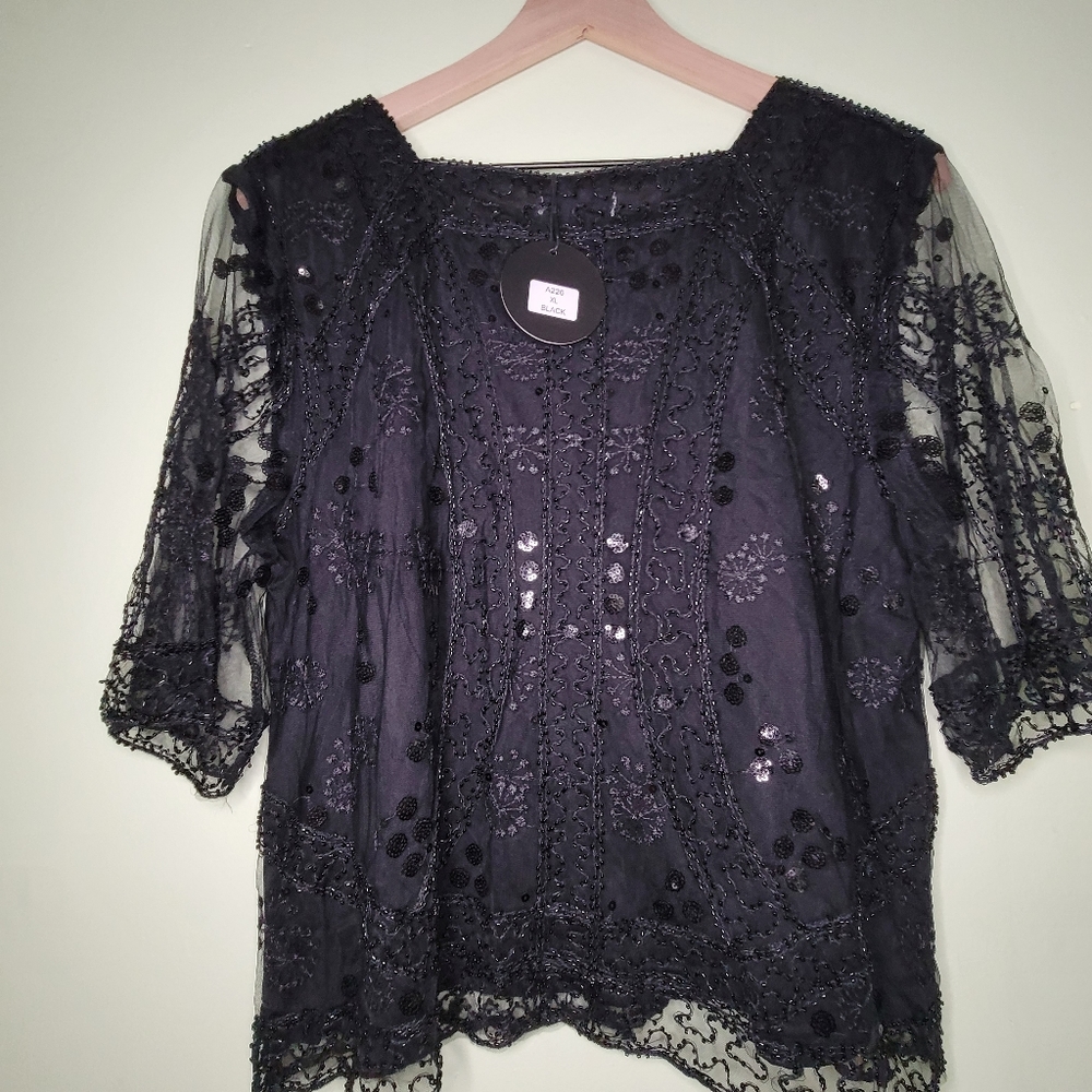 Black  top with accents 36